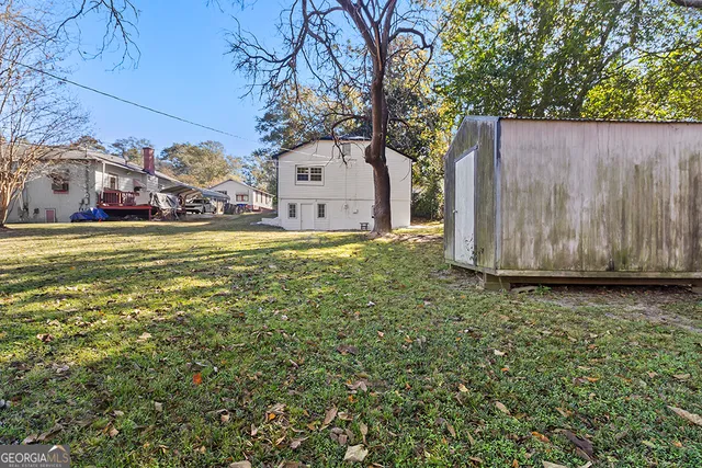 a house view with a garden space