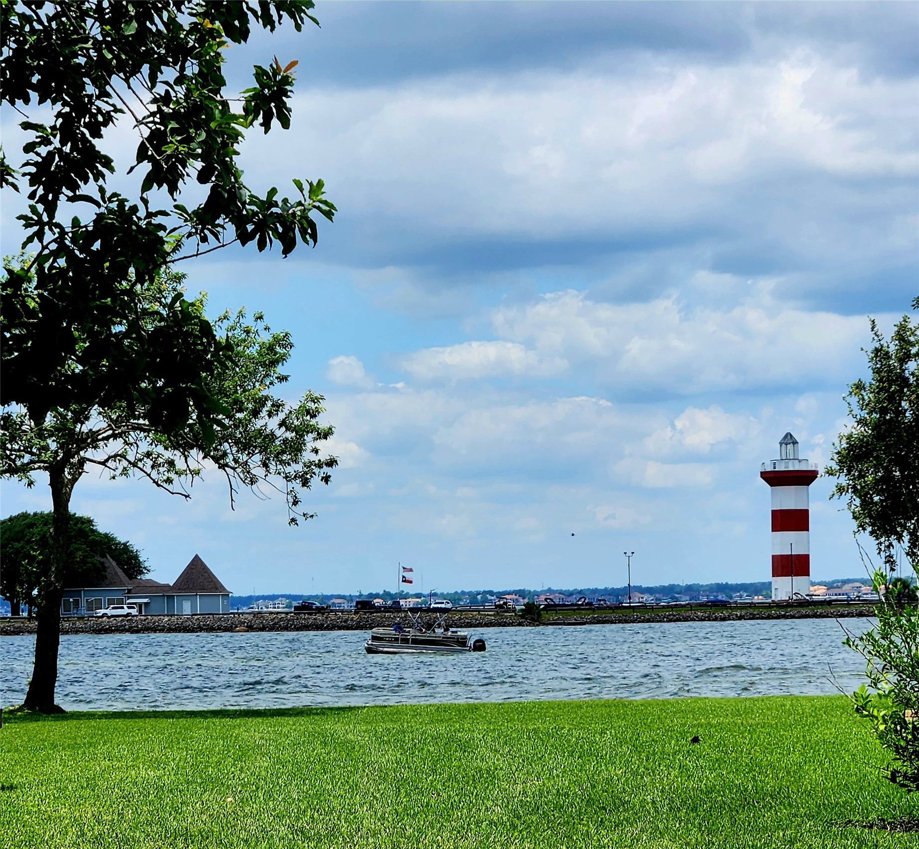 1607 Schooner Point Willis, TX 77318 - Photo 47 of 47 Local Harbour Town Club landmarks- The Outrigger and Lighthouse
