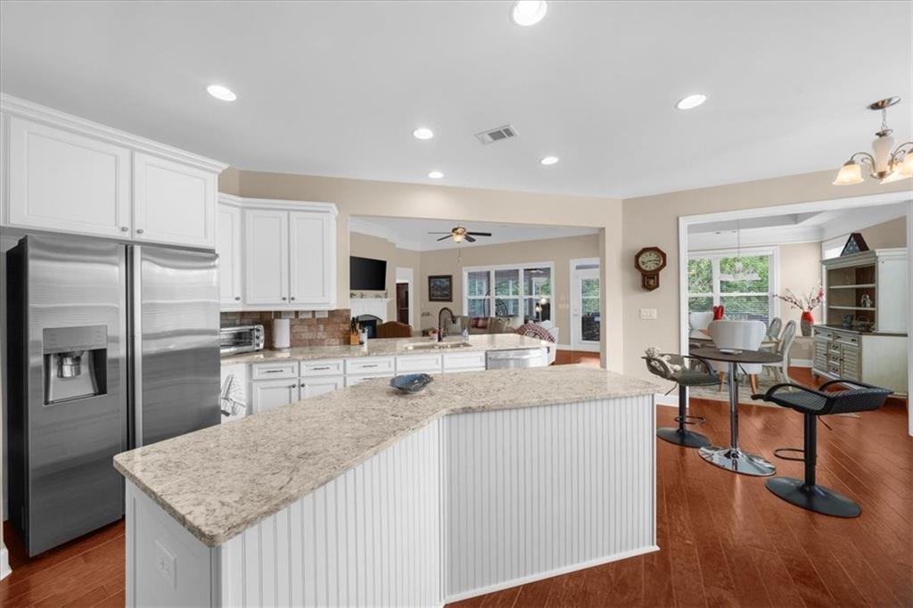 3709 Maple Shade Drive Southwest Gainesville, GA 30504 - Photo 23 of 81 a kitchen with counter top space cabinets and stainless steel appliances