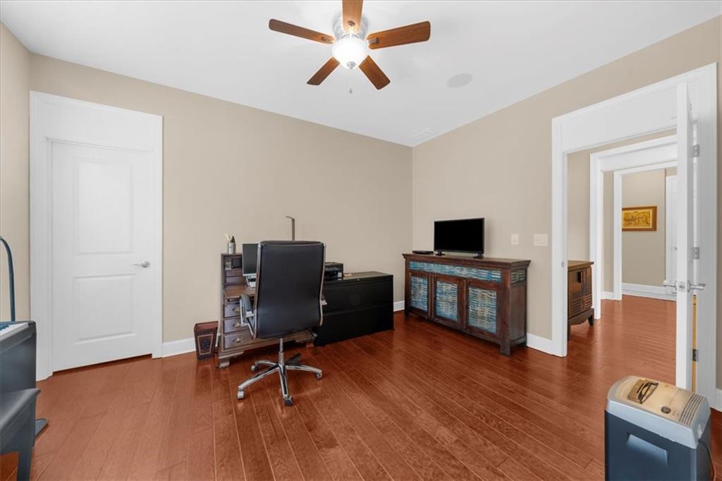 3709 Maple Shade Drive Southwest Gainesville, GA 30504 - Photo 39 of 81 a view of a workspace with furniture and wooden floor