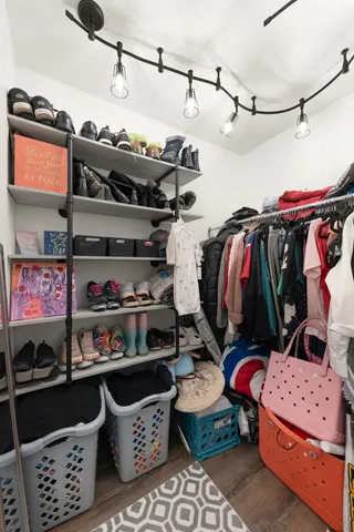 a store room with lots of different colored cloths