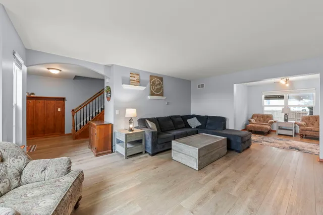 a living room with furniture and a couch