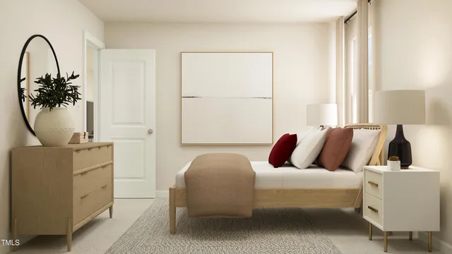 a bedroom with a bed and a couch