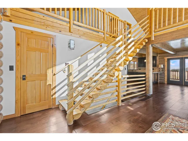 a view of entryway with wooden floor