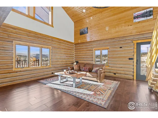 a view of a patio with wooden floor