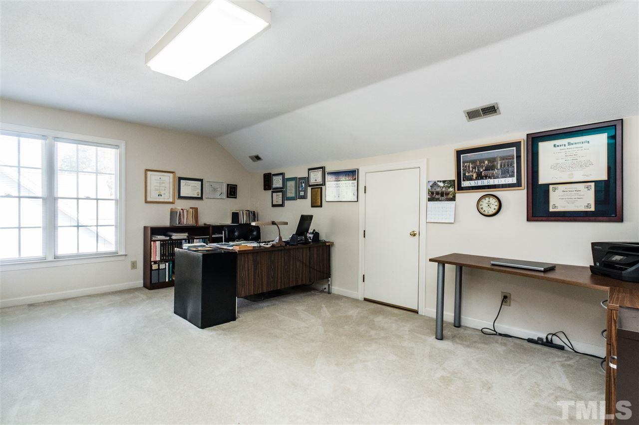 3324 Harden Road Raleigh, NC 27607 - Photo 22 of 25 a living room with furniture and windows