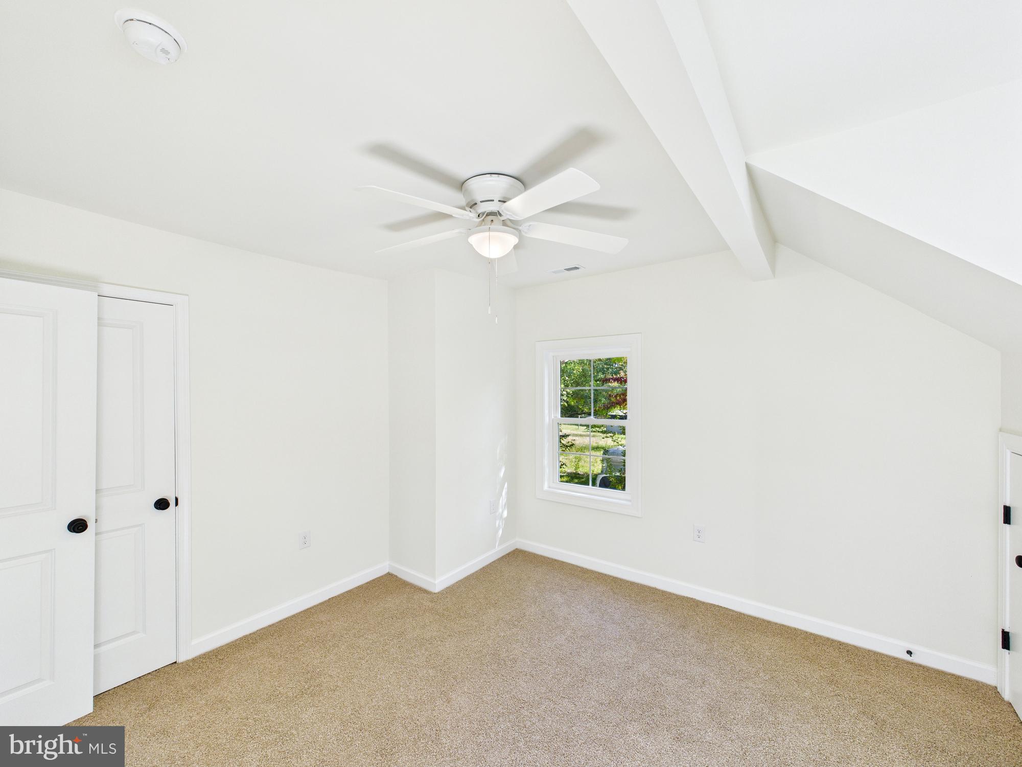 22202 Wetipquin Road Quantico, MD 21856 - Photo 20 of 42 an empty room with windows and fan