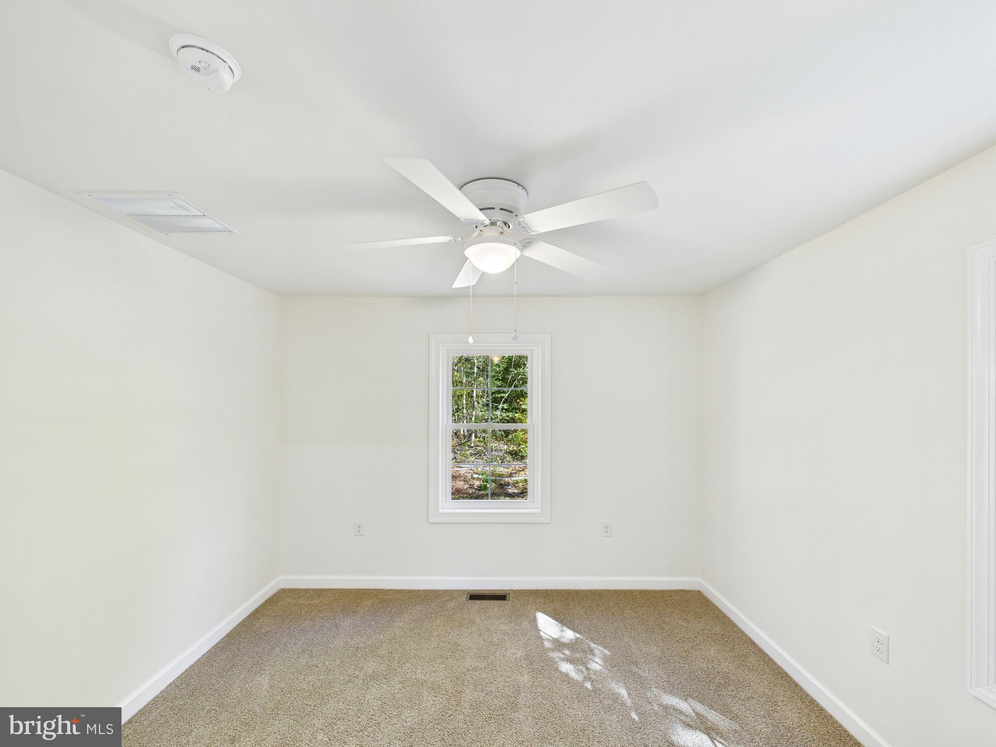 22202 Wetipquin Road Quantico, MD 21856 - Photo 33 of 42 an empty room with a window