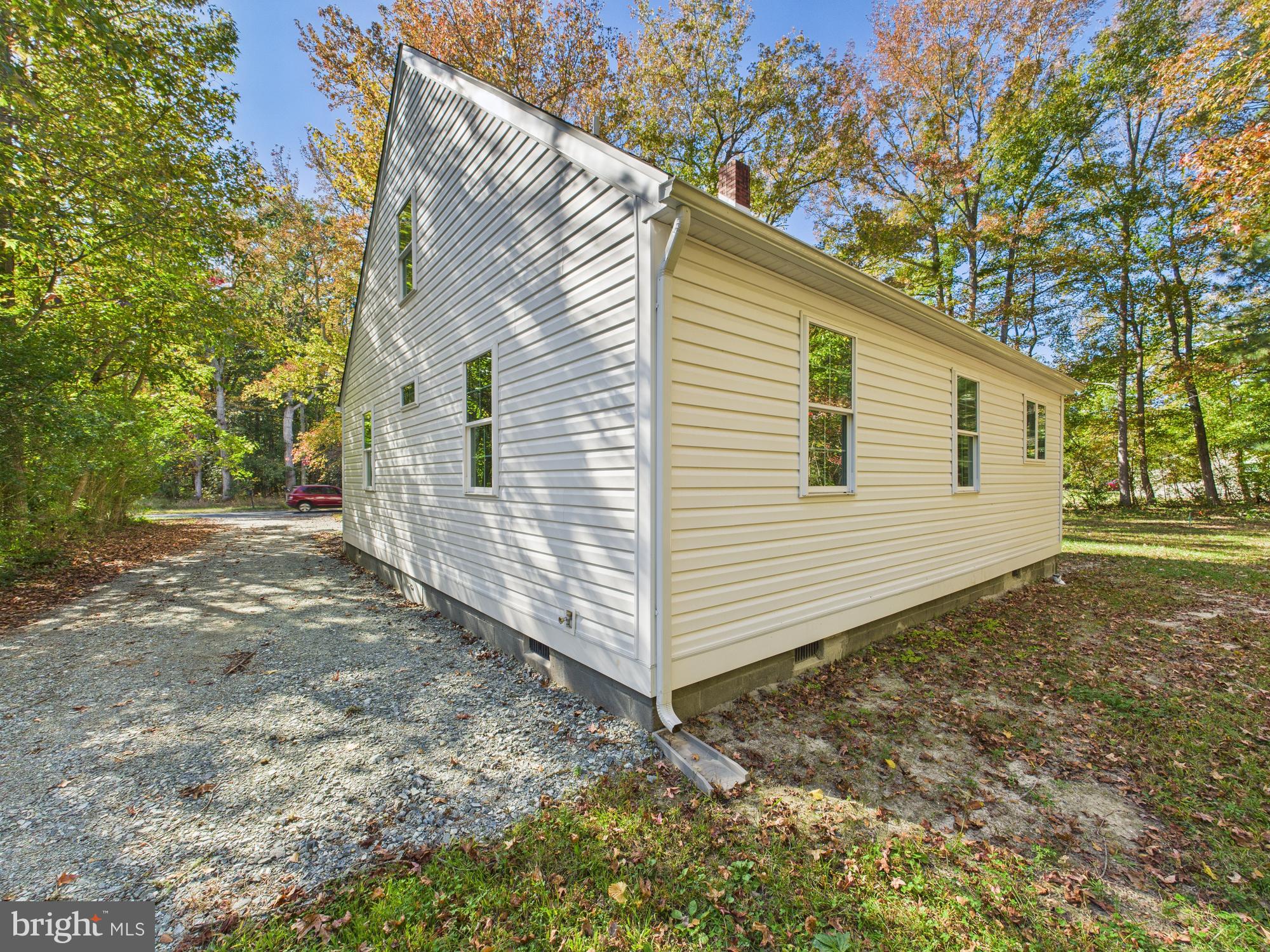 22202 Wetipquin Road Quantico, MD 21856 - Photo 41 of 42 a view of a house with a yard