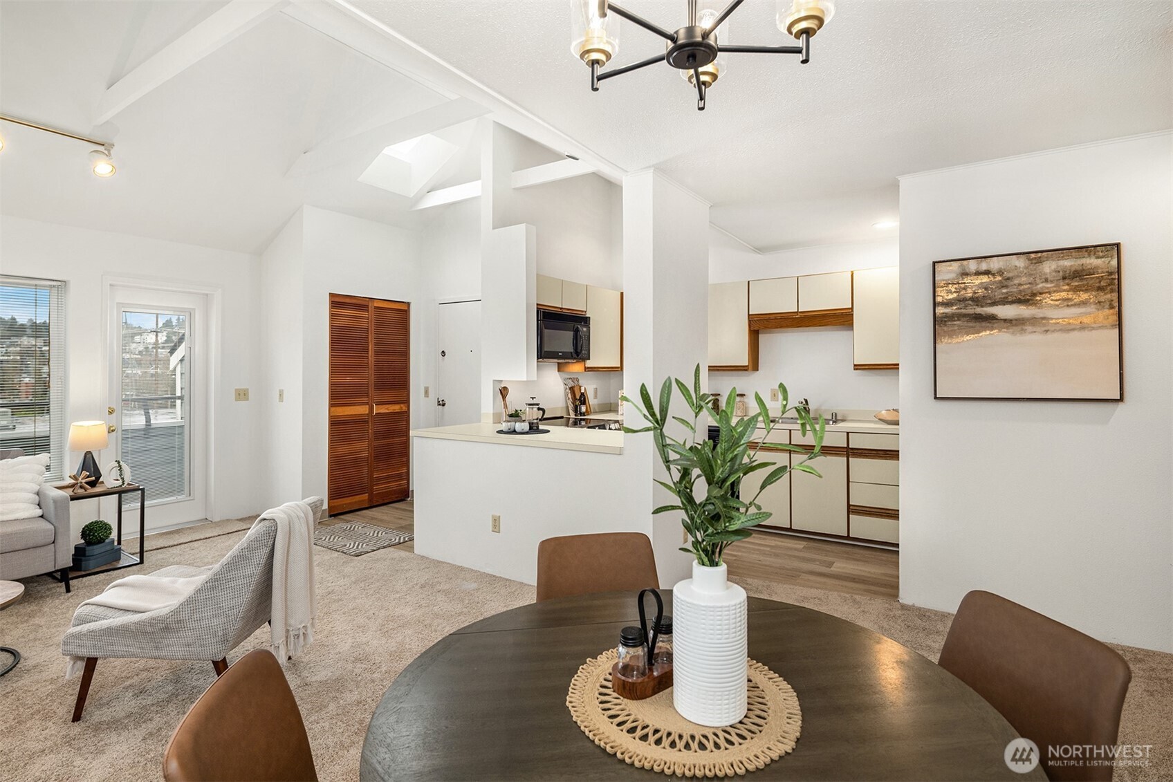 57 Etruria Street, Unit 201 Seattle, WA 98109 - Photo 10 of 26 a living room with furniture