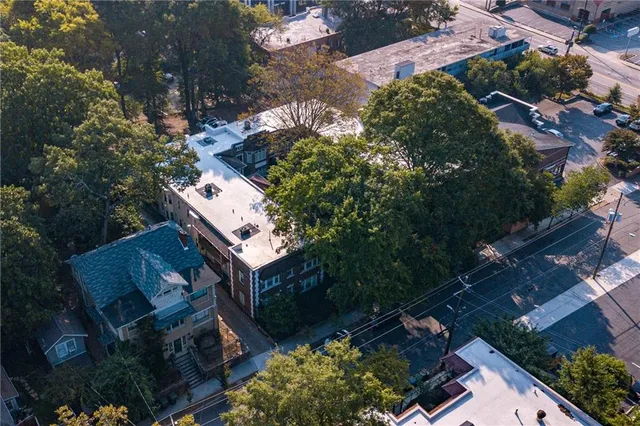 a view of a car park in front of building