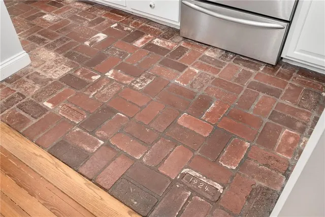 a bedroom with a flat screen television and a bed