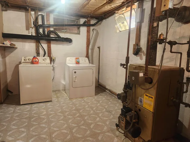 a room with water heater and storage