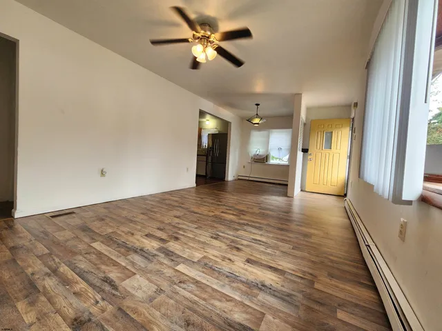 a view of an empty room and window