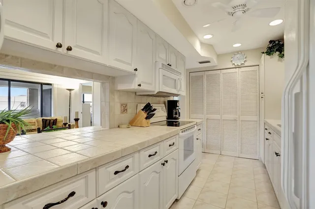 a view of a bathroom with a glass door shower