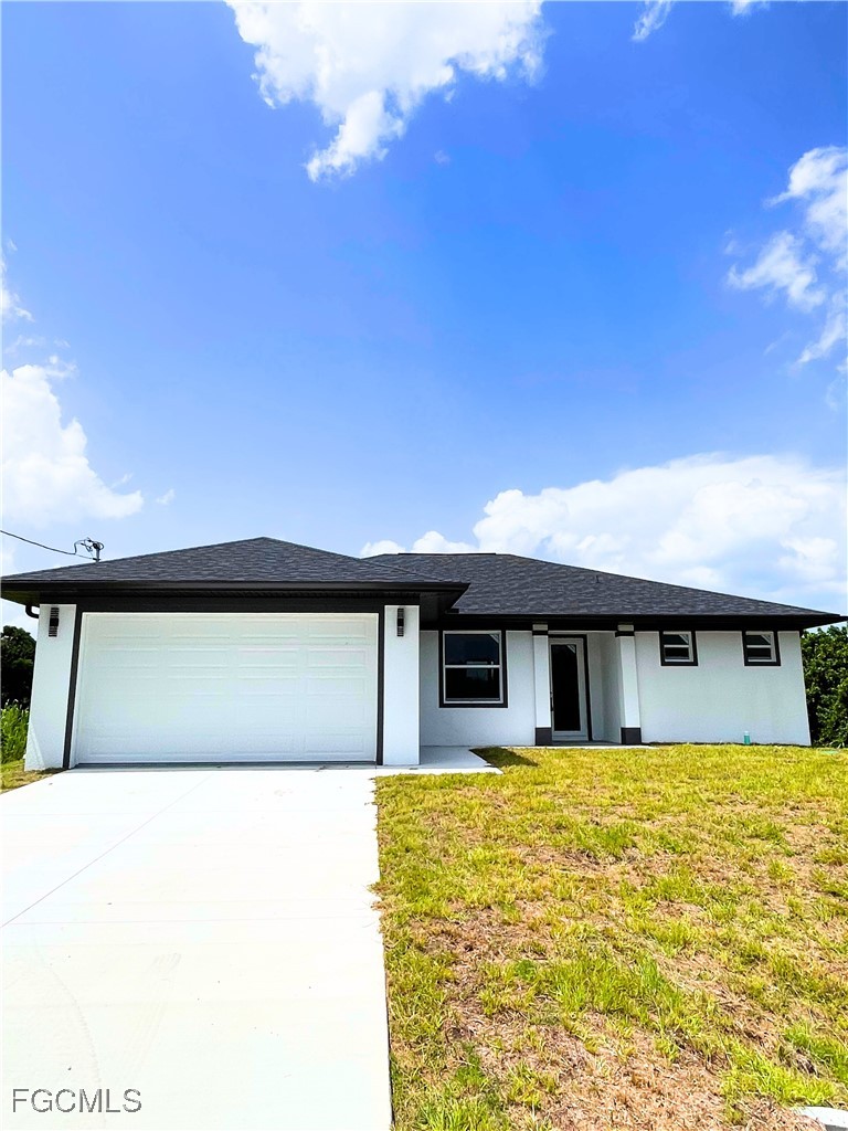 a house view with swimming pool in front of it