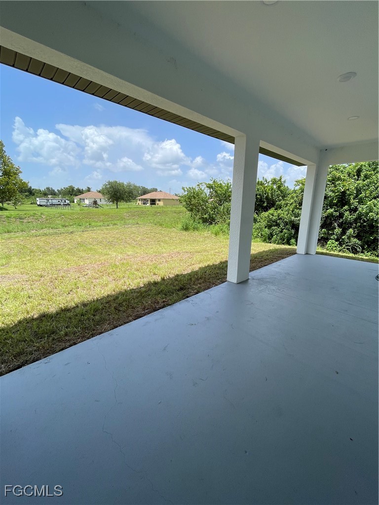 4308 15th Street Southwest Lehigh Acres, FL 33976 - Photo 26 of 27 a view of an ocean from a balcony