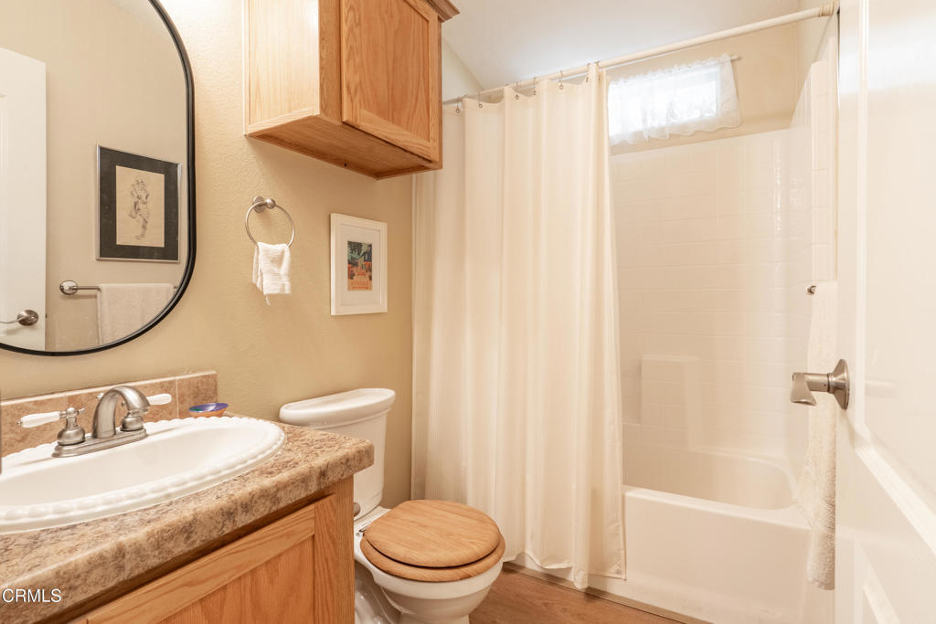 1273 South Rice Road, Unit 12 Ojai, CA 93023 - Photo 11 of 27 a bathroom with a granite countertop sink toilet and shower