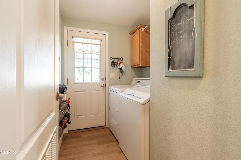 1273 South Rice Road, Unit 12 Ojai, CA 93023 - Photo 12 of 27 a storage room with a window and washer