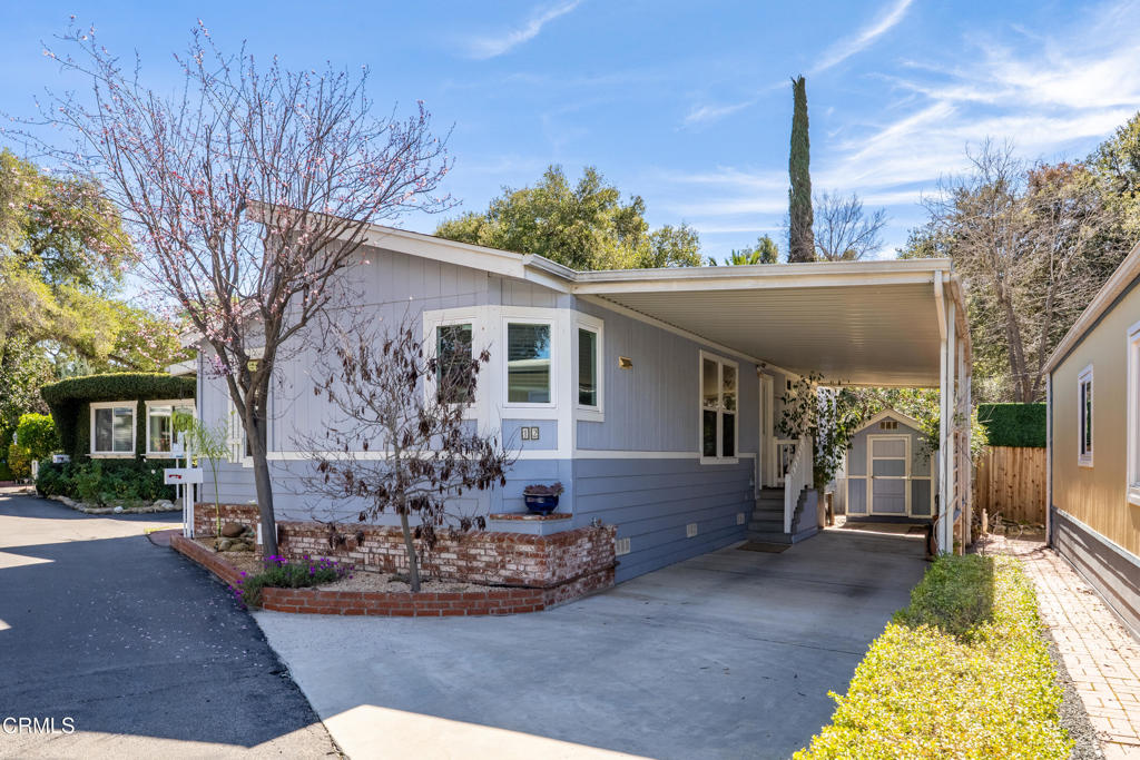 1273 South Rice Road, Unit 12 Ojai, CA 93023 - Photo 3 of 27 a front view of a house with garden
