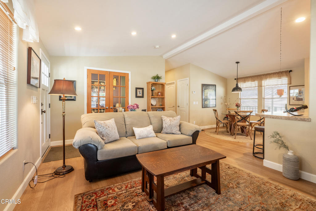 1273 South Rice Road, Unit 12 Ojai, CA 93023 - Photo 6 of 27 a living room with furniture potted plant and a large window