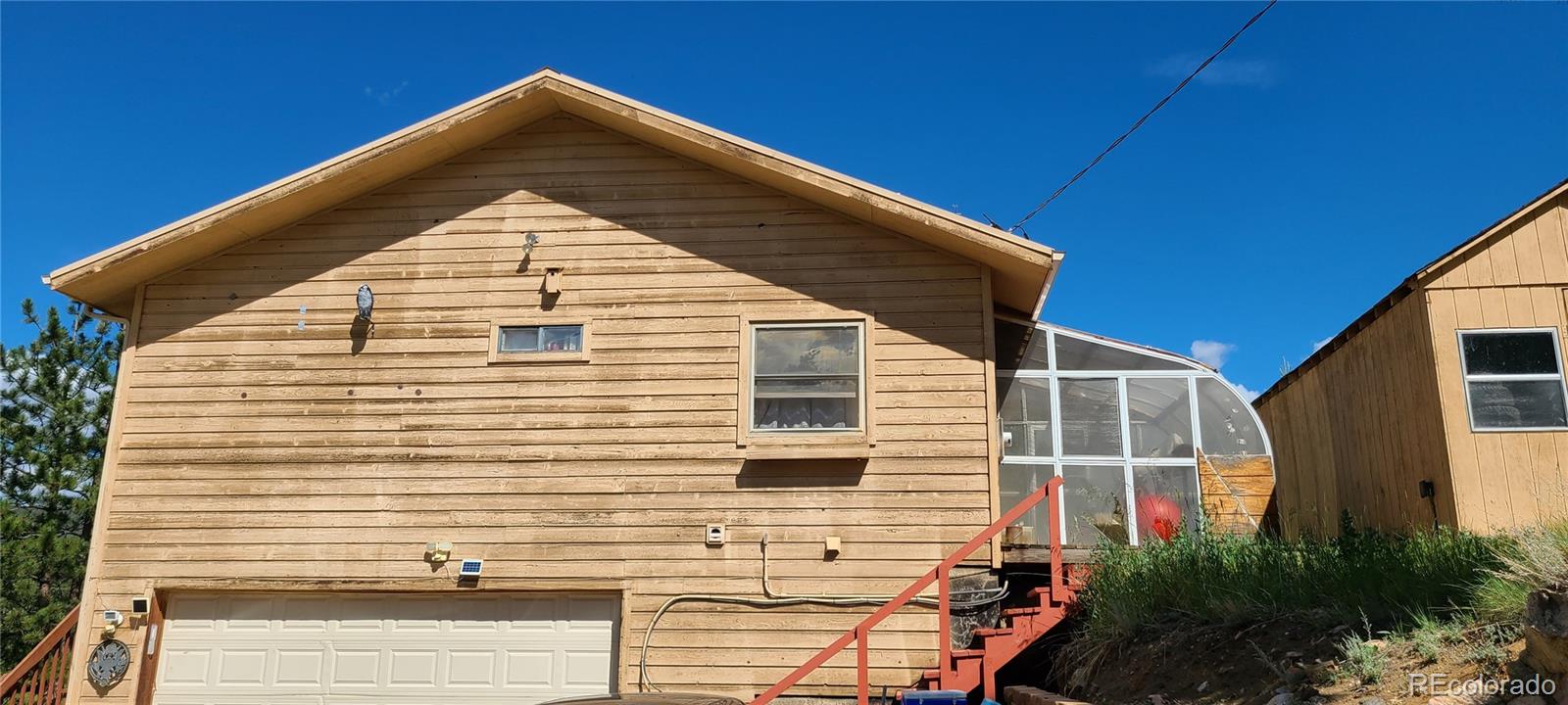 445 Rosalie Road Bailey, CO 80421 - Photo 12 of 21 a view of house with yard