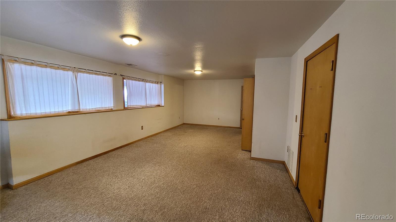 445 Rosalie Road Bailey, CO 80421 - Photo 19 of 21 an empty room with windows