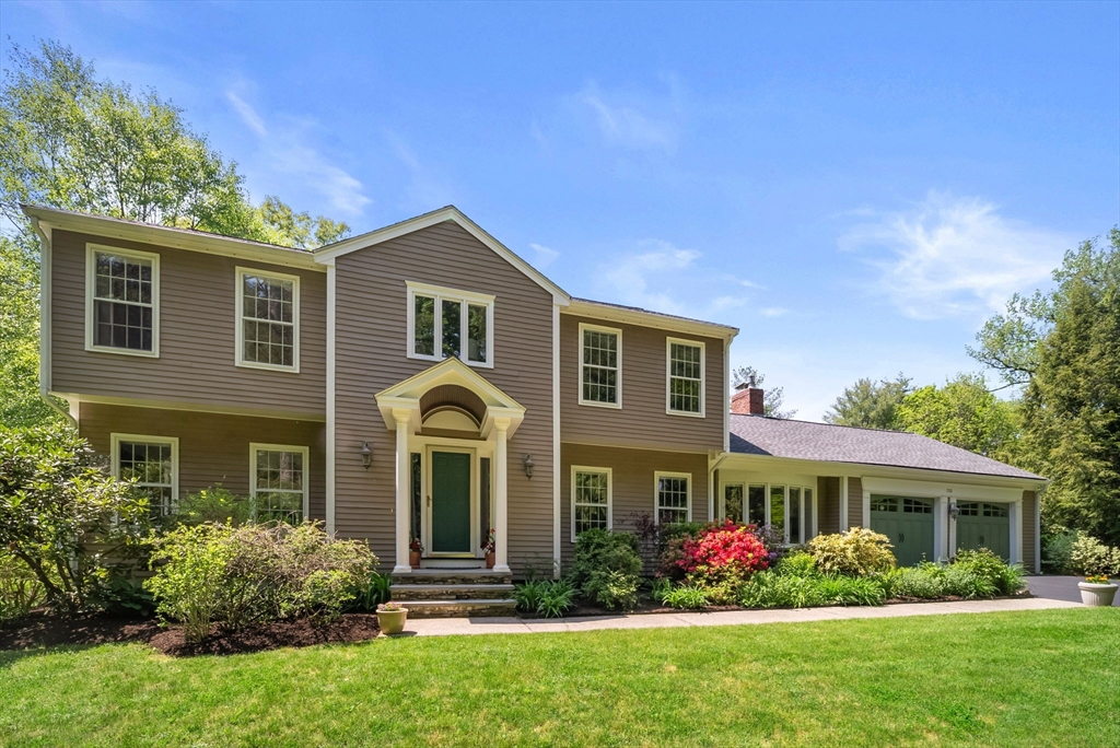 120 Lincoln Road Wayland, MA 01778 - Photo 1 of 34 a front view of a house with garden