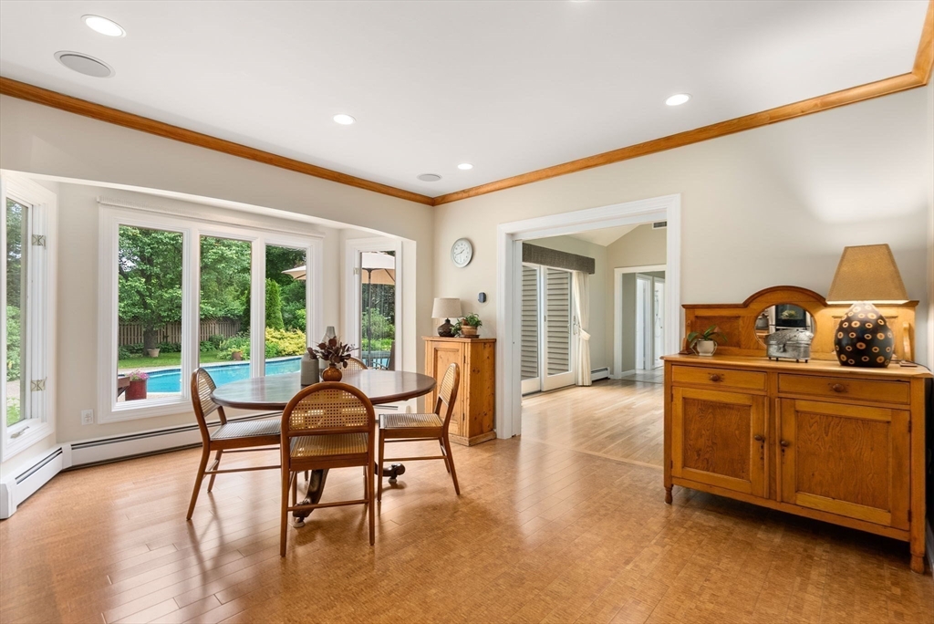 120 Lincoln Road Wayland, MA 01778 - Photo 13 of 34 a dining room with furniture and a floor to ceiling window