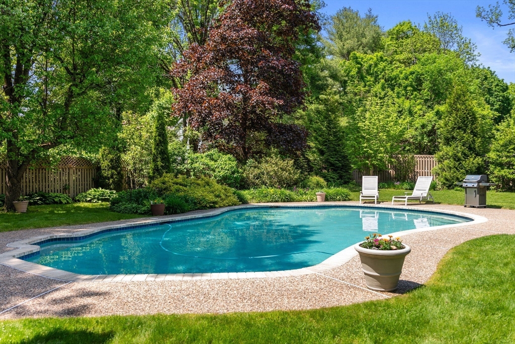 120 Lincoln Road Wayland, MA 01778 - Photo 18 of 34 a view of a back yard with a fountain