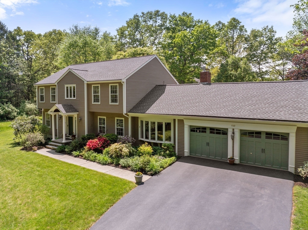 120 Lincoln Road Wayland, MA 01778 - Photo 33 of 34 a front view of a house with garden