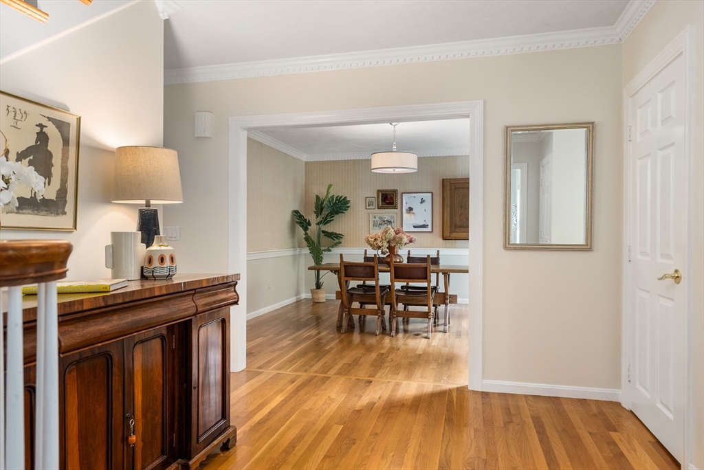 120 Lincoln Road Wayland, MA 01778 - Photo 4 of 34 a view of a dining room with furniture and wooden floor