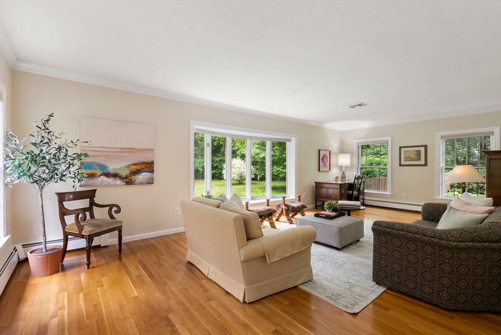 120 Lincoln Road Wayland, MA 01778 - Photo 7 of 34 a living room with furniture and a potted plant
