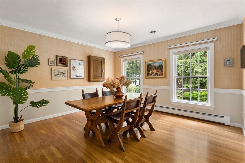 120 Lincoln Road Wayland, MA 01778 - Photo 9 of 34 a view of a dining room with furniture window and wooden floor