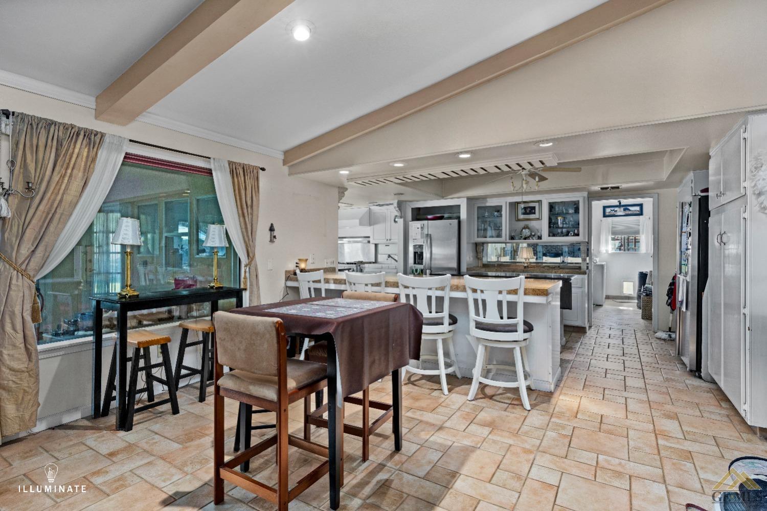 Undisclosed Address Bakersfield, CA 93311 - Photo 4 of 14 a view of a dining room with furniture window and outside view