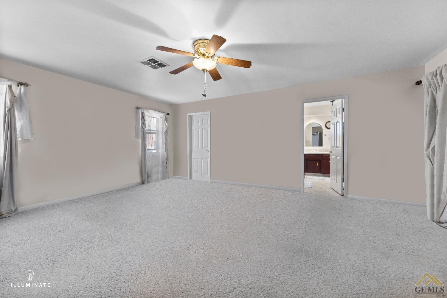 Undisclosed Address Bakersfield, CA 93311 - Photo 9 of 14 a view of an empty room with a chandelier fan