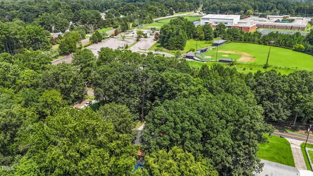 a view of a garden with a swimming pool