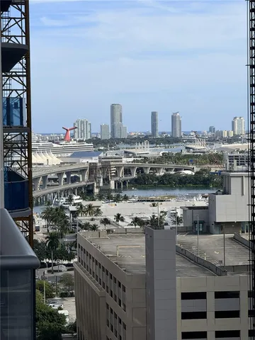 a kitchen with a table chairs stove and cabinets