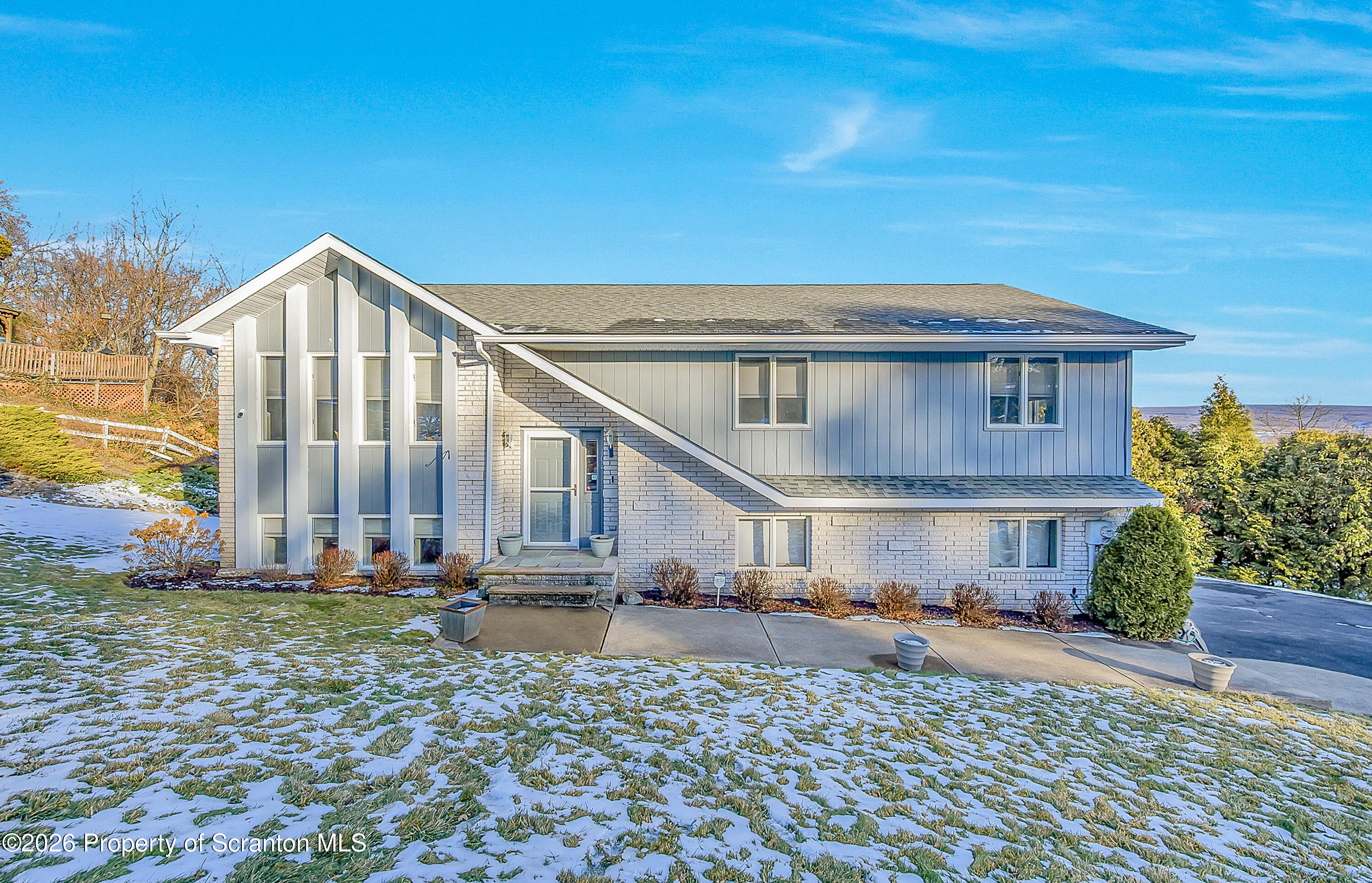 102 Glenstone Road Dickson City, PA 18519 - Photo 1 of 39 a view of a big house with a yard