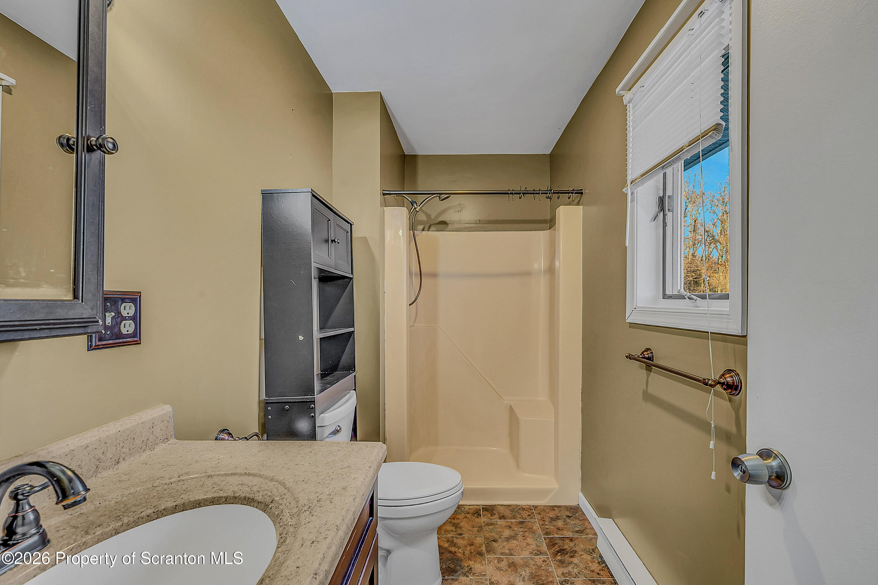 102 Glenstone Road Dickson City, PA 18519 - Photo 17 of 39 a bathroom with a granite countertop sink toilet and shower