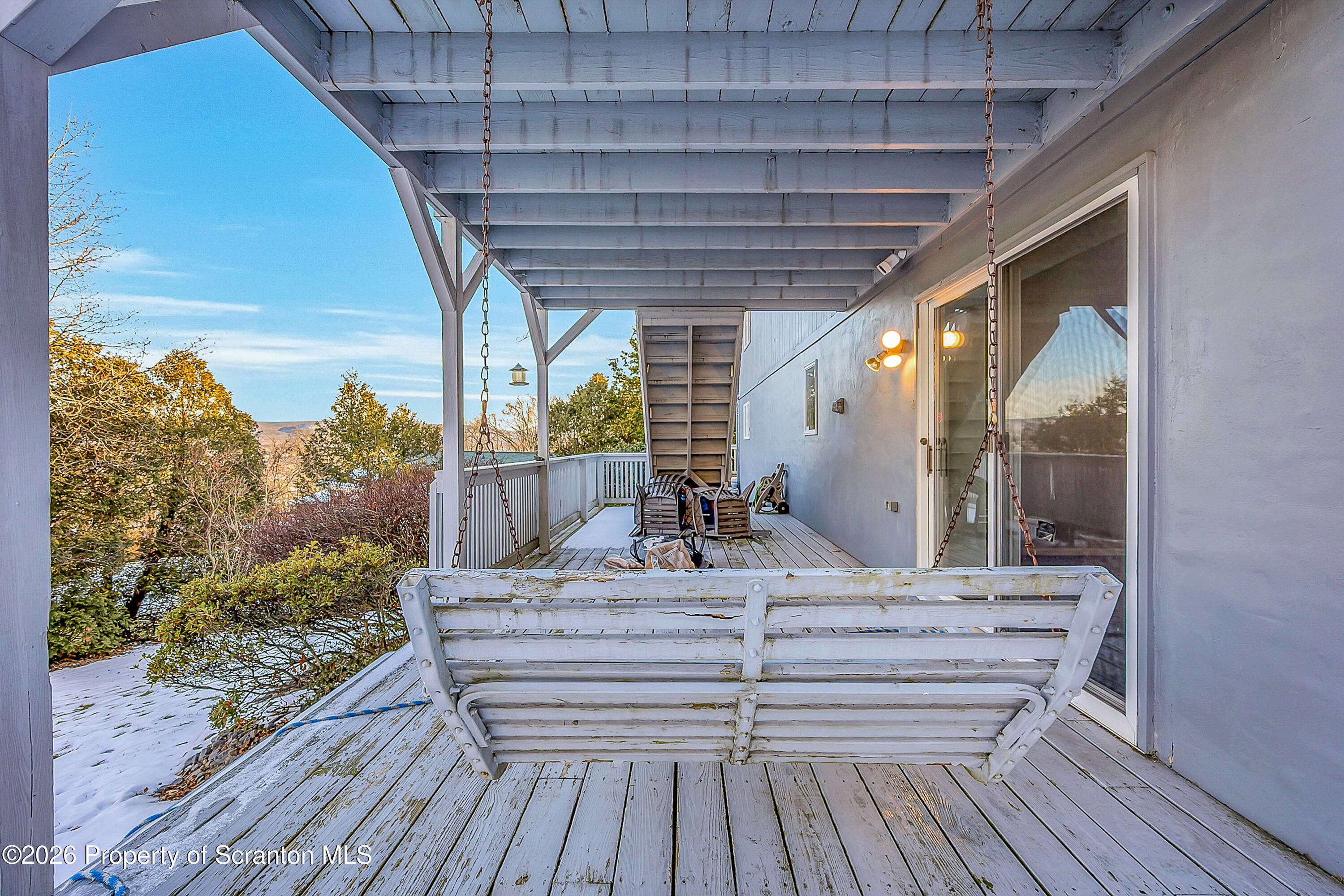 102 Glenstone Road Dickson City, PA 18519 - Photo 31 of 39 a view of balcony with wooden floor