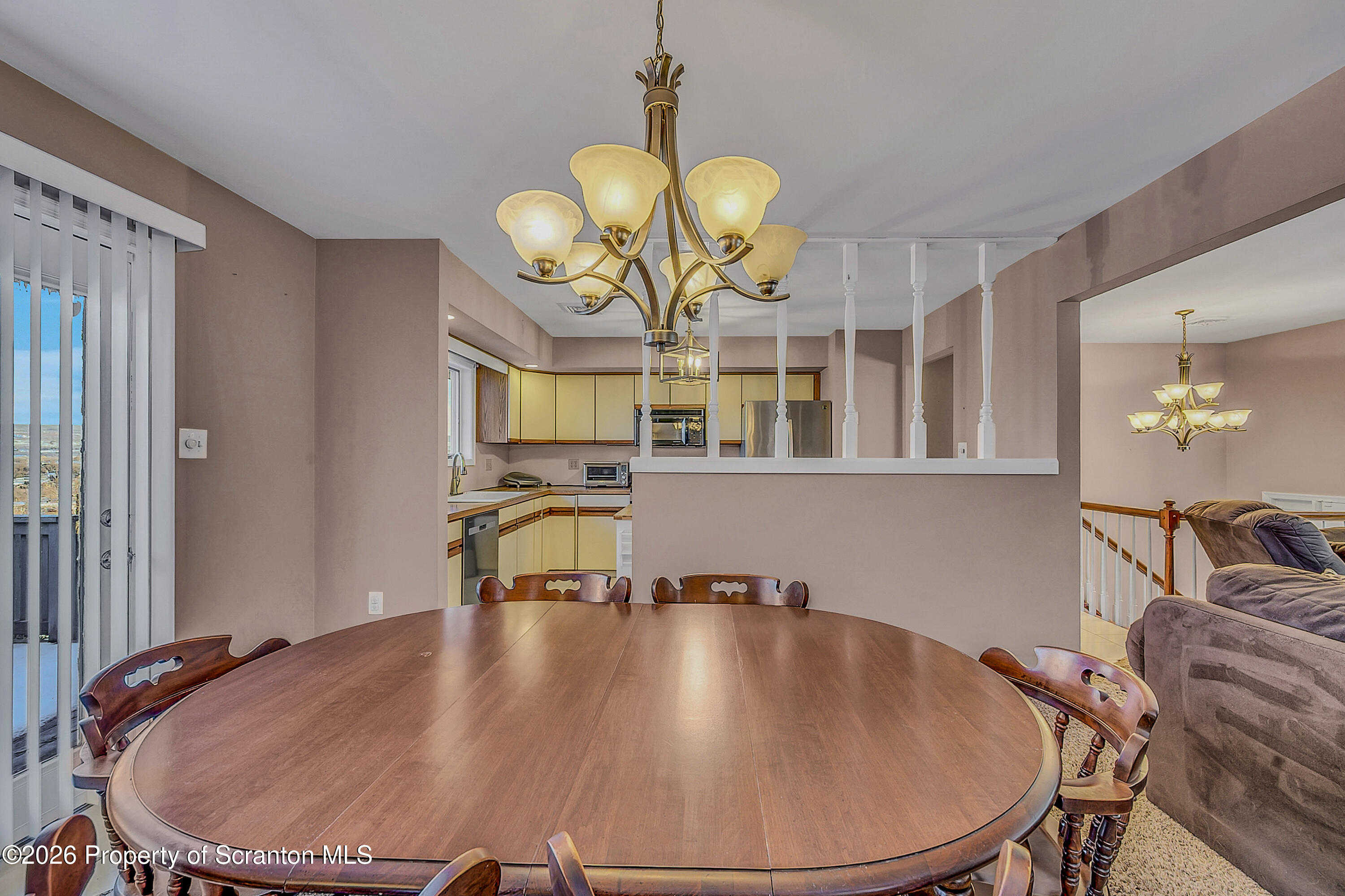 102 Glenstone Road Dickson City, PA 18519 - Photo 5 of 39 a view of a dining room with furniture wooden floor and chandelier