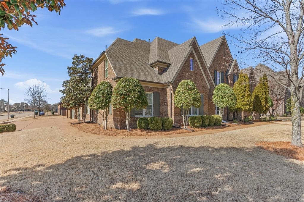 1301 Conser Street Collierville, TN 38017 - Photo 2 of 39 a view of a house with a snow in the yard