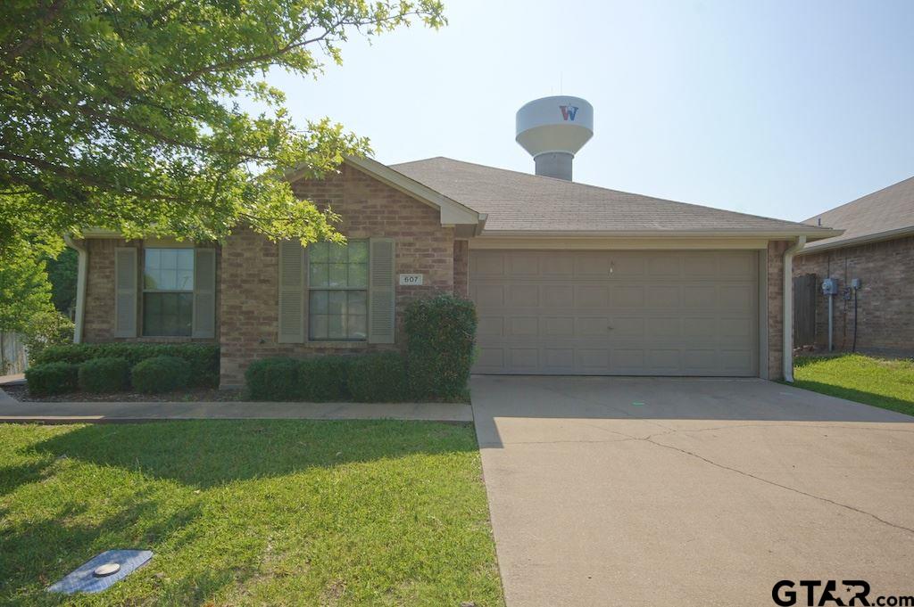 609 Hagan Road Whitehouse, TX 75791 - Photo 2 of 28 a front view of a house with garden