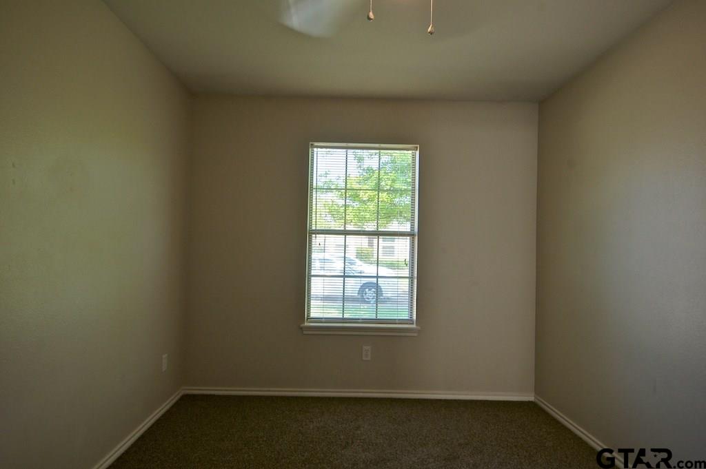 609 Hagan Road Whitehouse, TX 75791 - Photo 22 of 28 an empty room with a window
