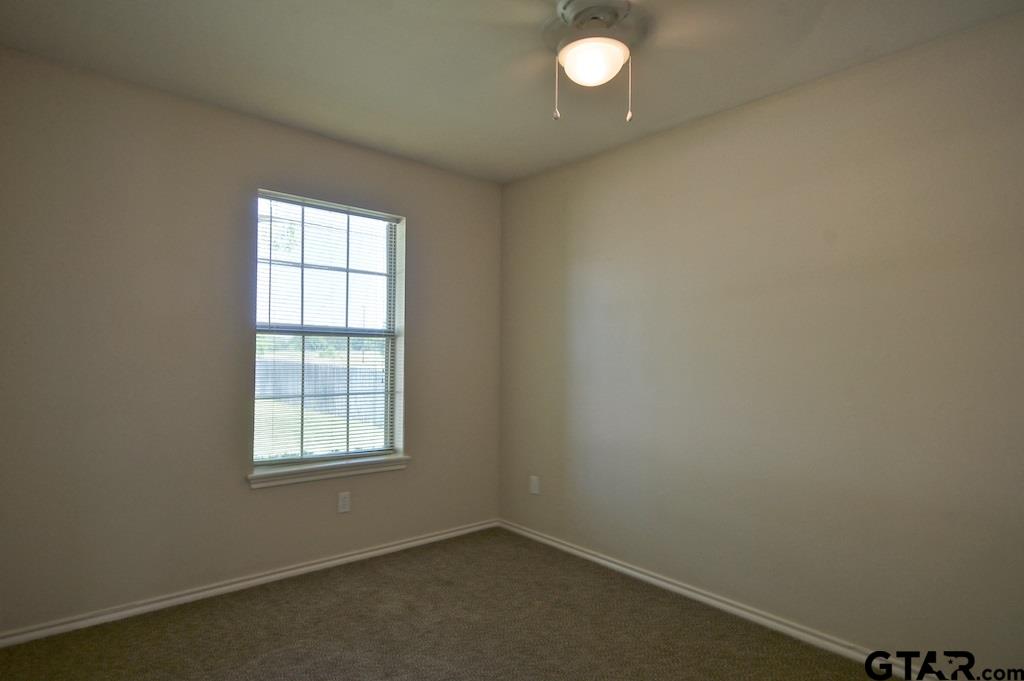 609 Hagan Road Whitehouse, TX 75791 - Photo 23 of 28 an empty room with a window