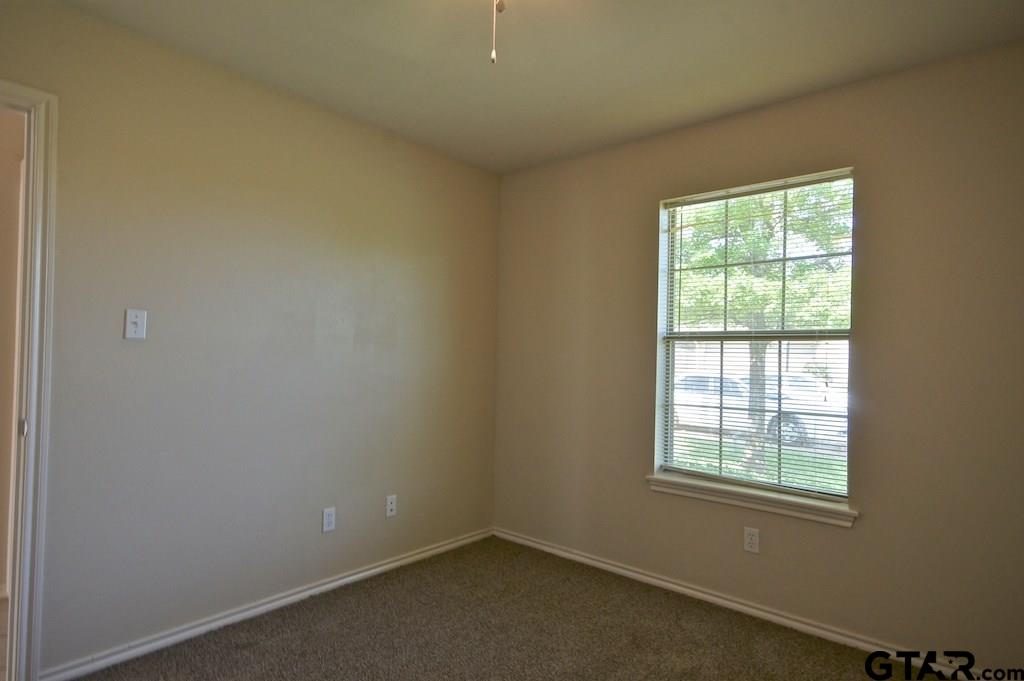 609 Hagan Road Whitehouse, TX 75791 - Photo 24 of 28 an empty room with a window