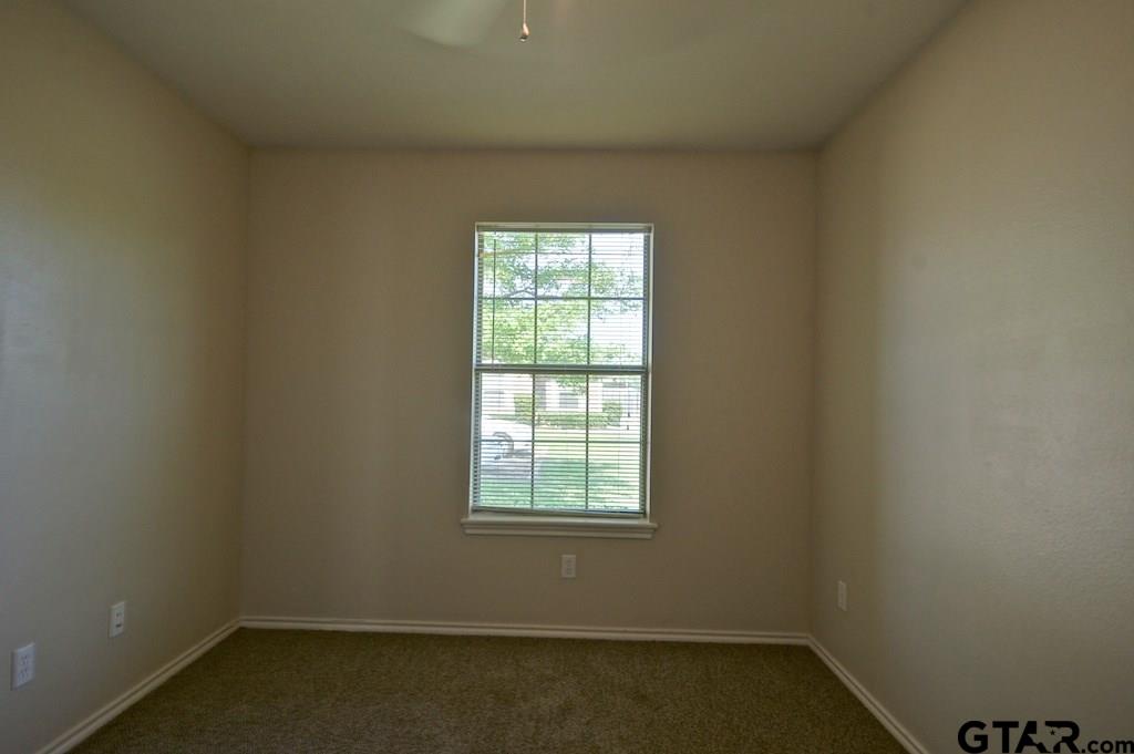 609 Hagan Road Whitehouse, TX 75791 - Photo 25 of 28 an empty room with a window