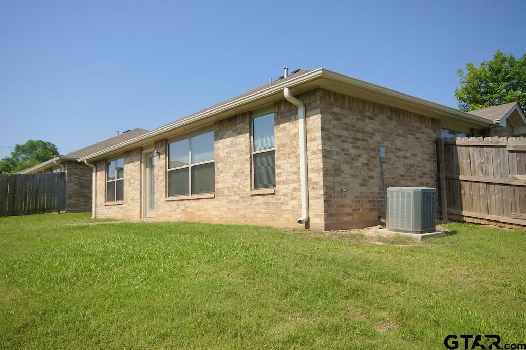 609 Hagan Road Whitehouse, TX 75791 - Photo 28 of 28 a front view of a house with a yard