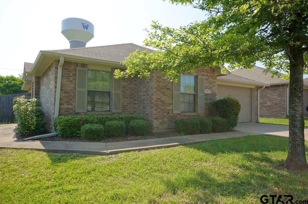 609 Hagan Road Whitehouse, TX 75791 - Photo 3 of 28 a front view of a house with garden